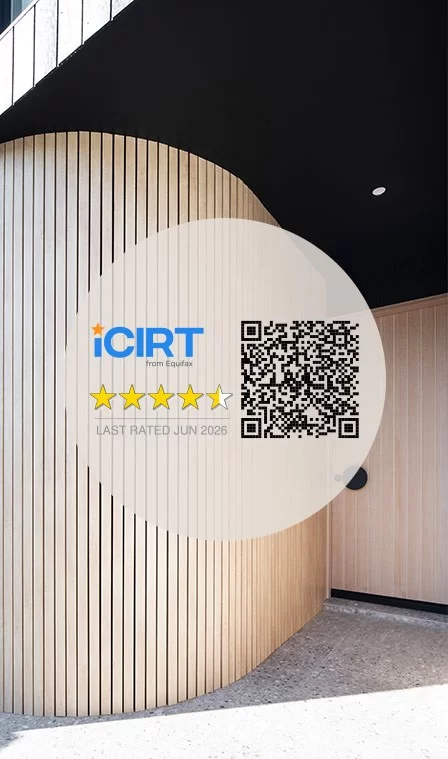 Timber-battened entry of a Brolen Homes home with the 4.5 Star Gold iCIRT rating and verification QR code
